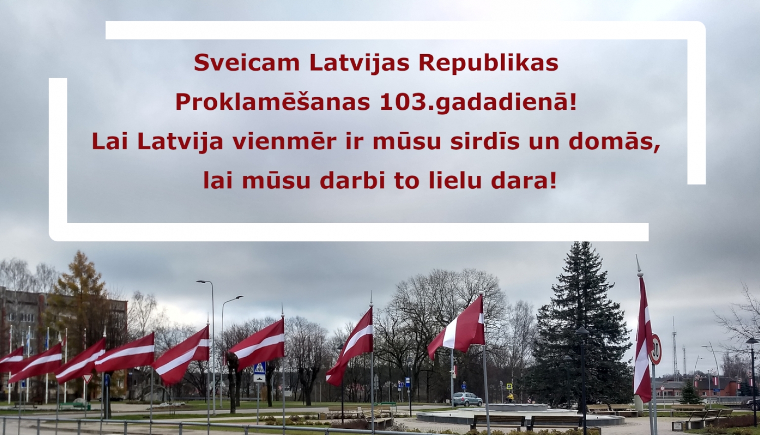 Attēls ar Latvijas karogiem un apsveikumu 18.novembrī